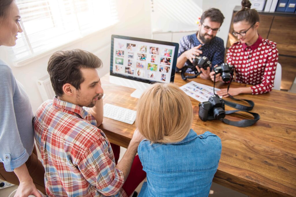 People creating content as part of entertainment marketing strategy