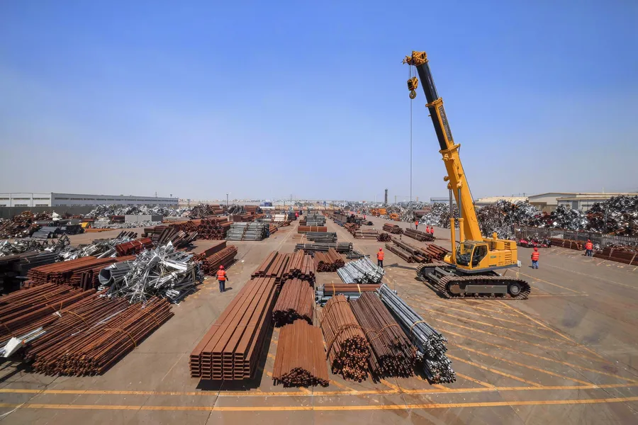 Scrap metal recycling yard with a crane, industrial and recycling network marketing